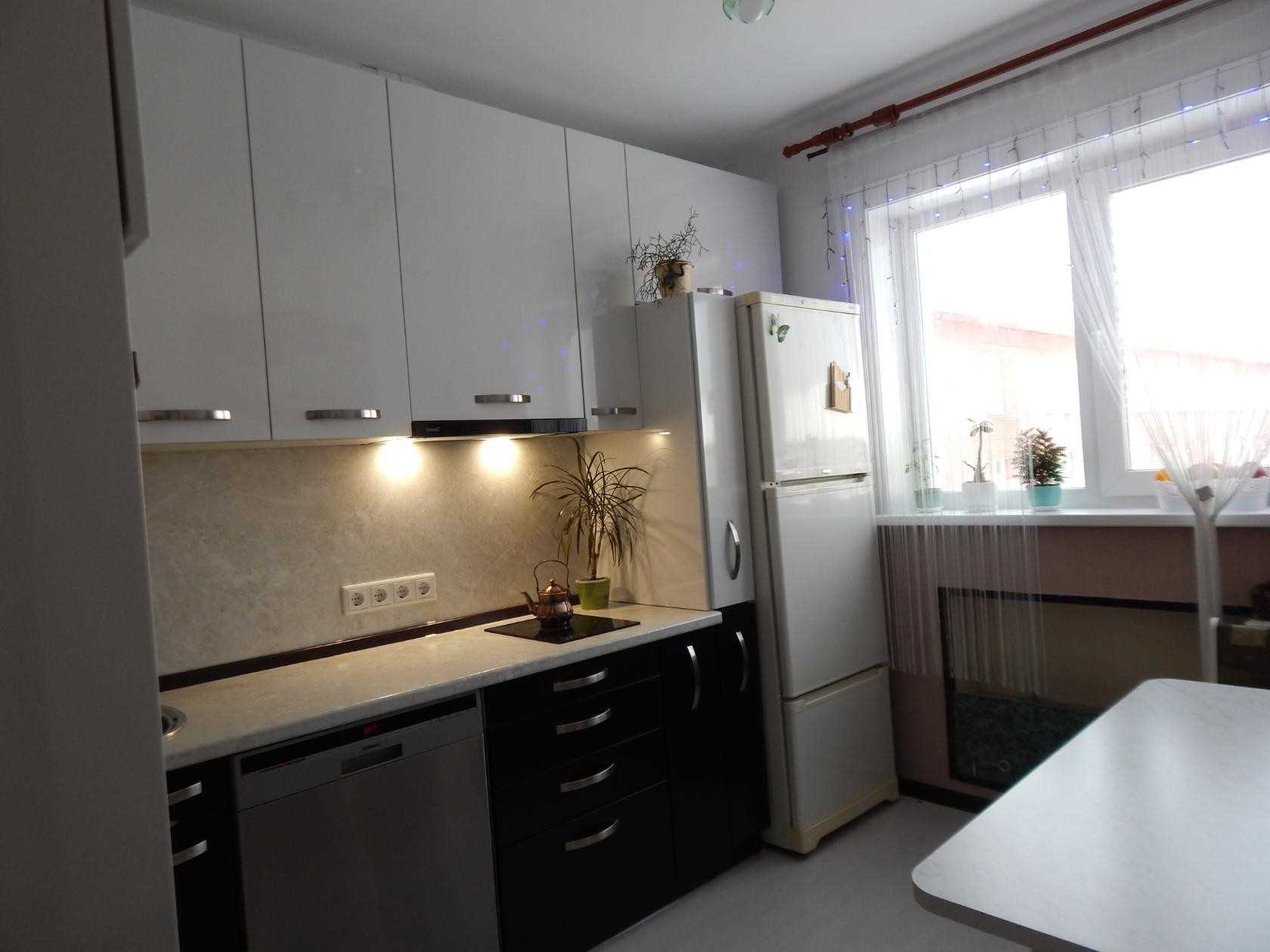 idea of ​​a bright interior of a kitchen of 9 sq.m
