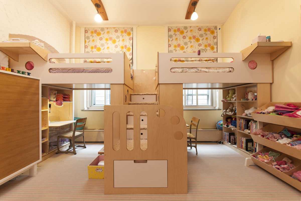 versione del bellissimo design di una camera per bambini per due ragazze