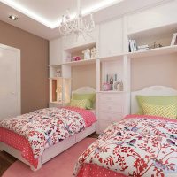 example of an unusual interior of a nursery for two girls photo