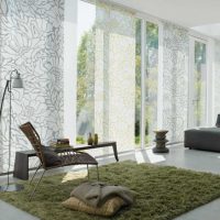 An example of using modern curtains in a bright design photo room