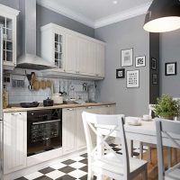 An example of a bright style kitchen 14 sq.m photo