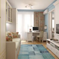 design of a studio apartment in beige and blue tones
