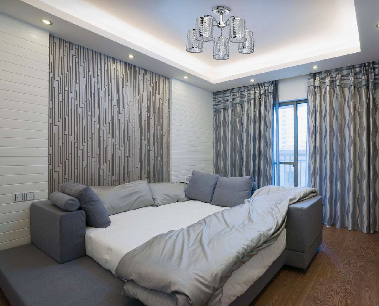 design camera da letto con carta da parati grigia