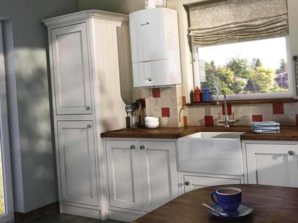 An example of a bright kitchen interior with a gas water heater
