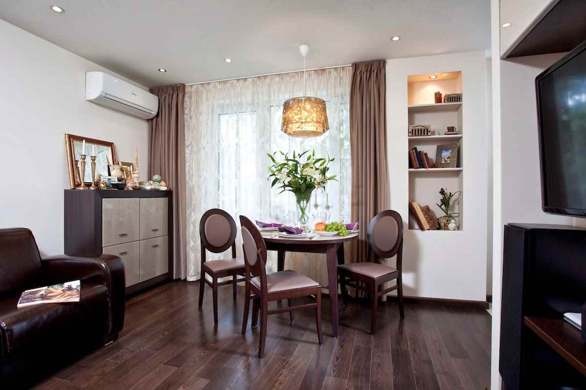 variant of the bright interior of a studio apartment of 26 square meters