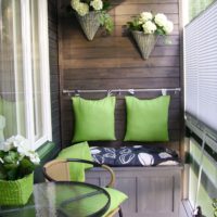 green in the design of a small balcony