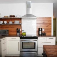 version of a light style kitchen in a wooden house photo