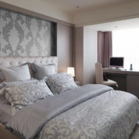 bedroom interior with gray wallpaper