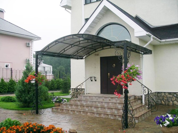 stone porch with a canopy