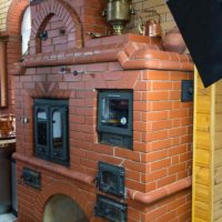 variant of using a beautiful Russian stove in a modern interior photo