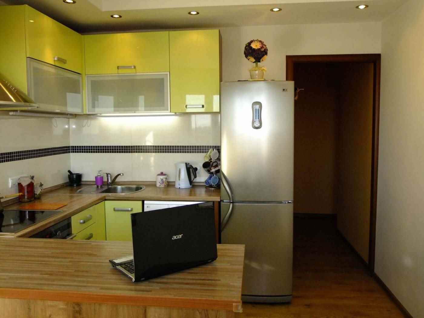 option of a bright interior of the kitchen 12 sq.m
