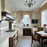 An example of a bright kitchen interior in a country house photo