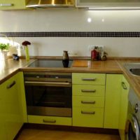 an example of an unusual design of a kitchen 12 sq.m photo