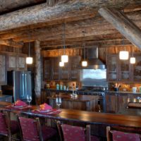 version of the bright decor of the kitchen in a wooden house photo