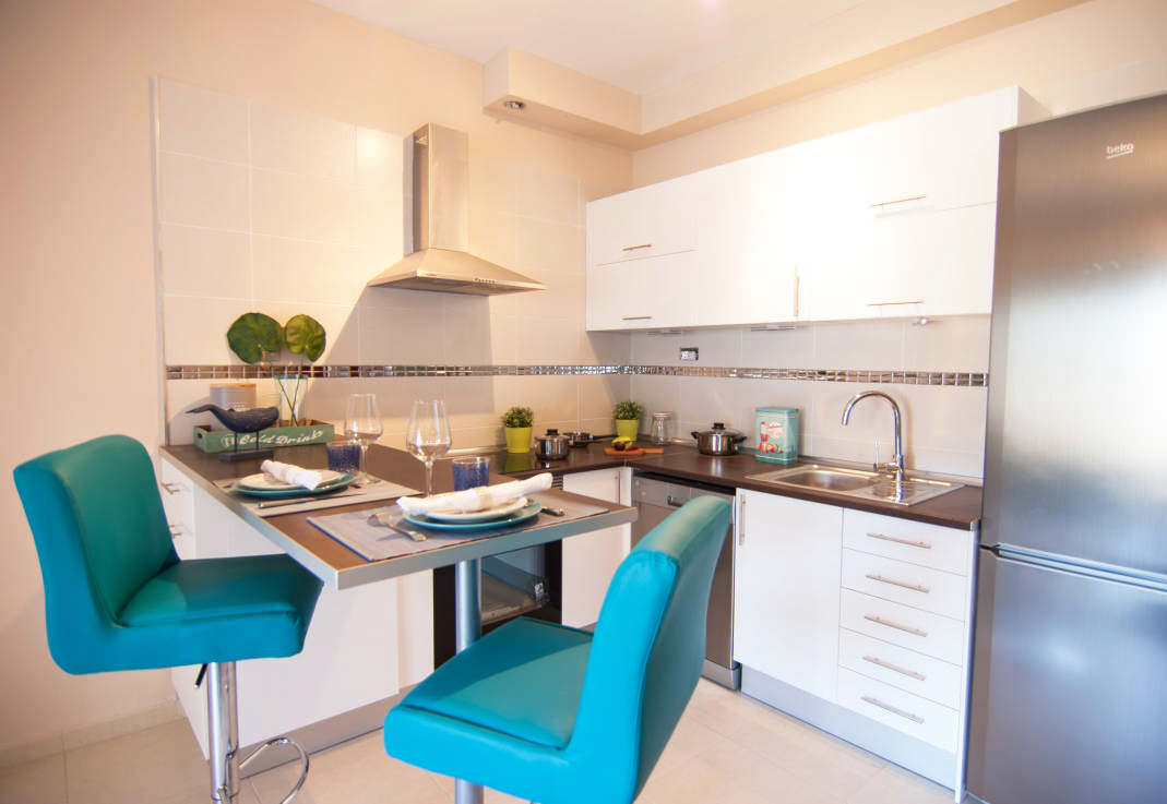 design of a small kitchen with a breakfast bar