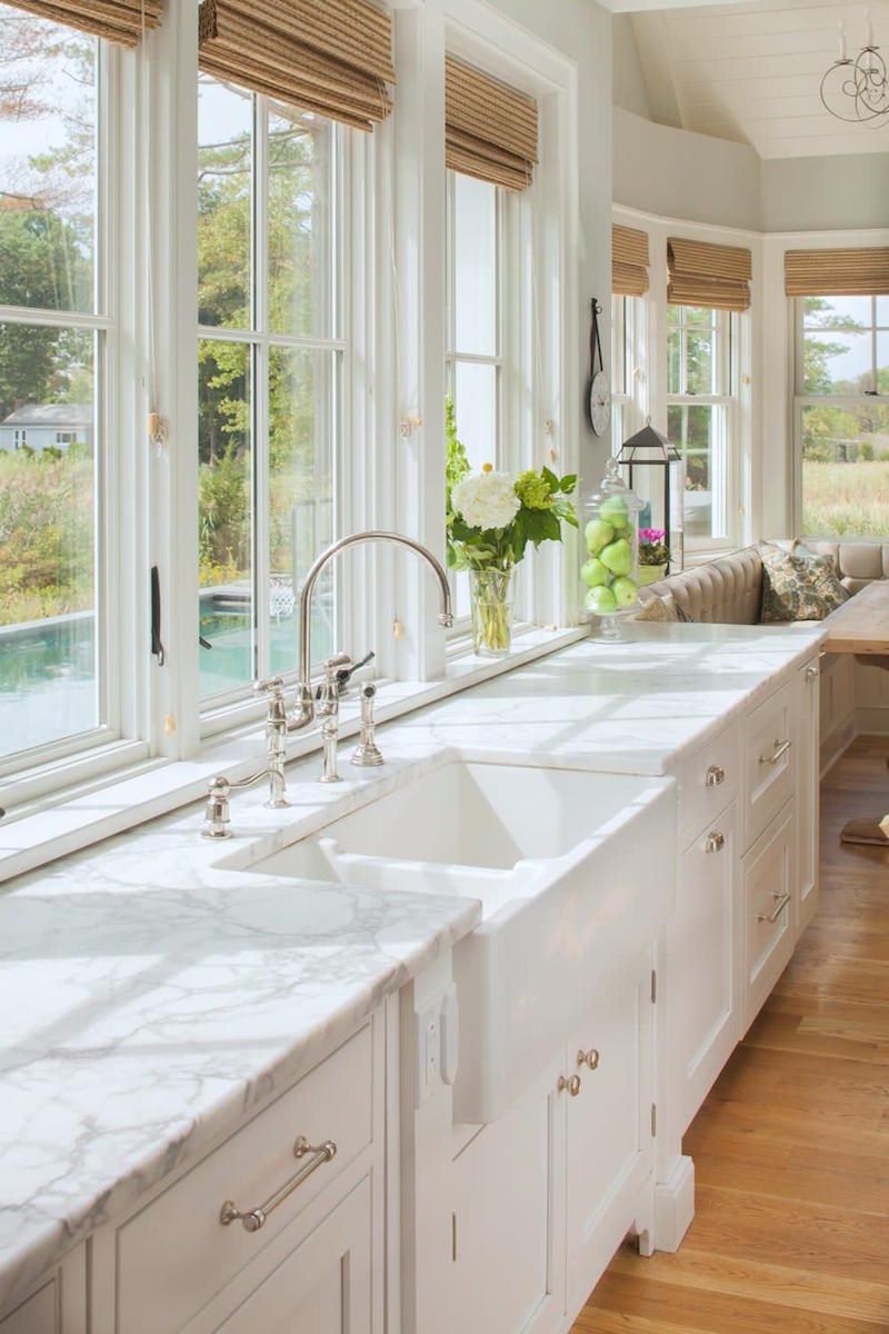 bright kitchen with marble countertops