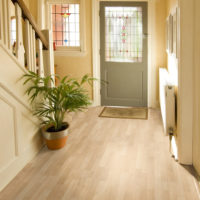 laminate in the hallway with stairs