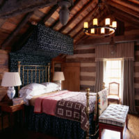 bedroom in a wooden house attic