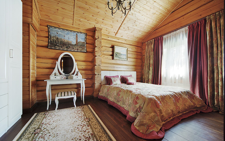 decor of a bedroom in a wooden house