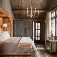 bedroom in wooden house design photo
