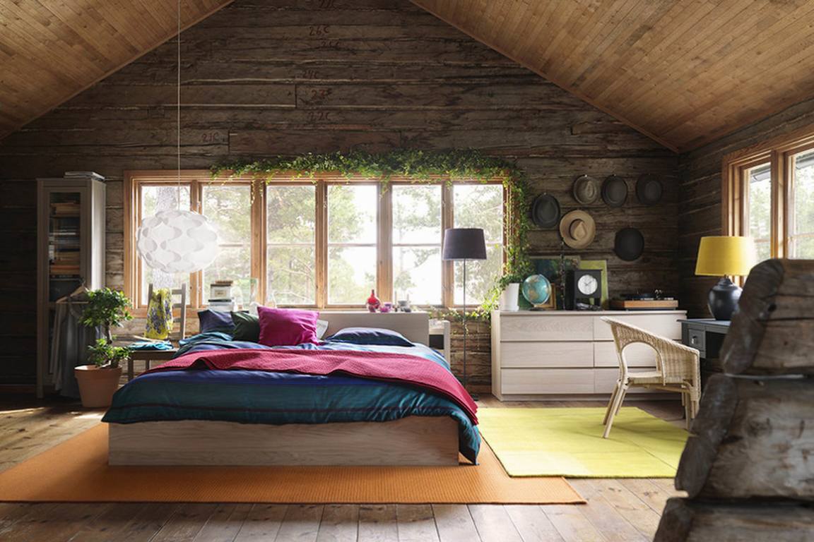 interior of a bedroom in a wooden house