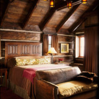 bedroom in a wooden house rustic style