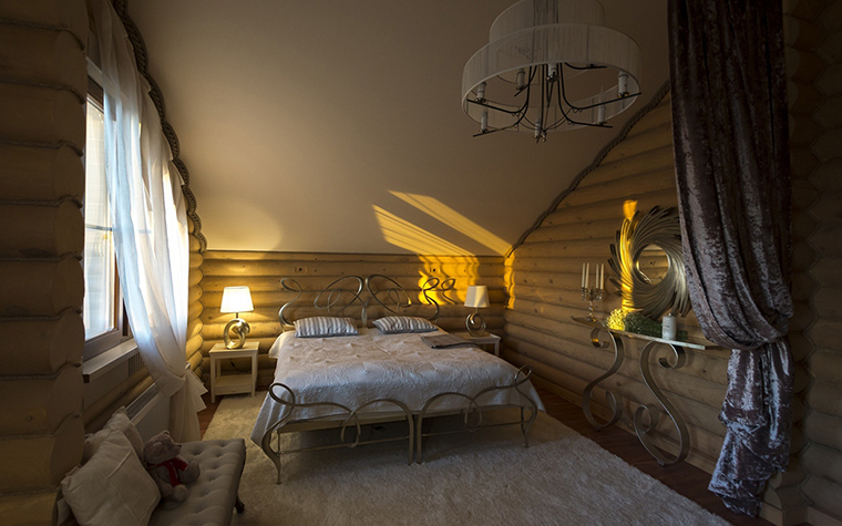 photo of a bedroom with a sloping roof