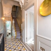 bright finish hallway with stairs