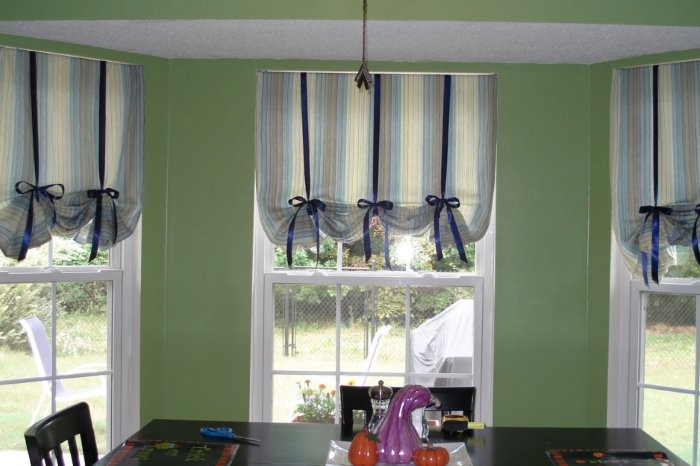 English curtains in high condition on the window in the living room