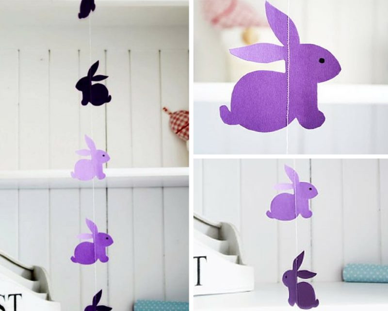 Paper garland of Easter bunnies in a festive interior
