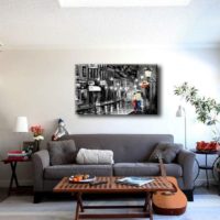 The picture above the sofa in the design of the living room