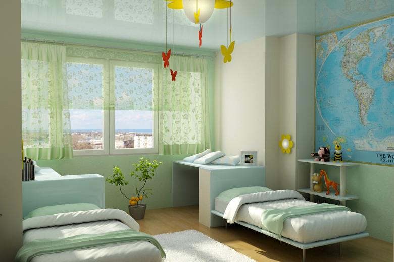 Deux lits dans une chambre d'enfants et une carte au mur