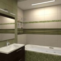The combination of mosaics and large tiles in the interior of the combined bathroom