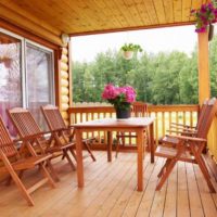 Cottage furniture made of slats on the open veranda