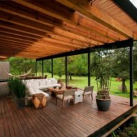 Outdoor terrace with wooden floor in the country