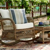 Rocking chair from a rattan on a country terrace