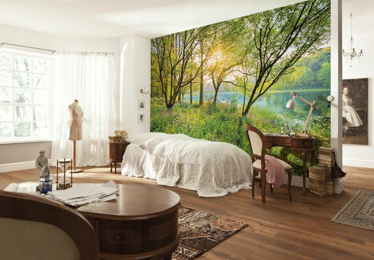 Wall mural with wildlife in the bedroom interior of a country house