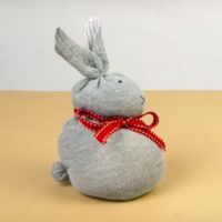 Simple easter bunny with a red bow