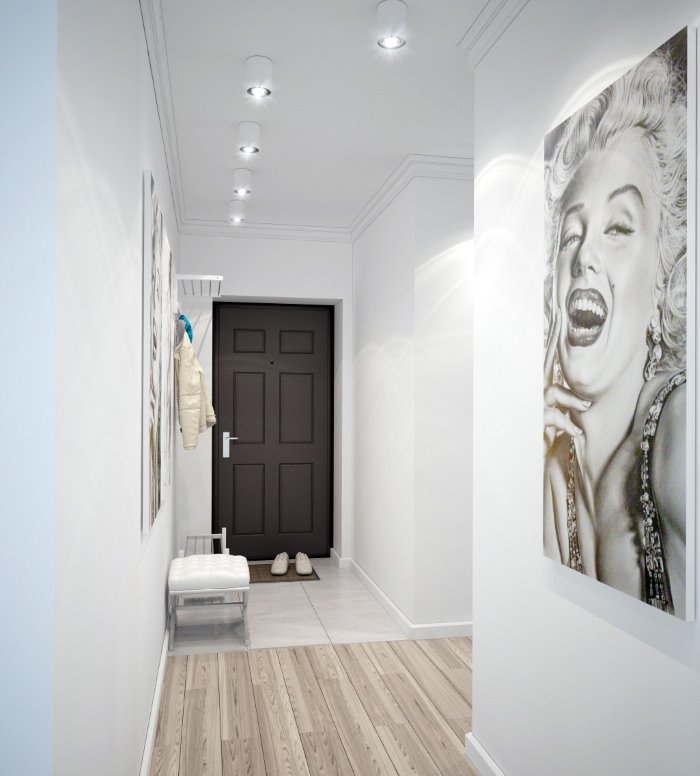 Corridor with white walls in the entrance hall of a city apartment