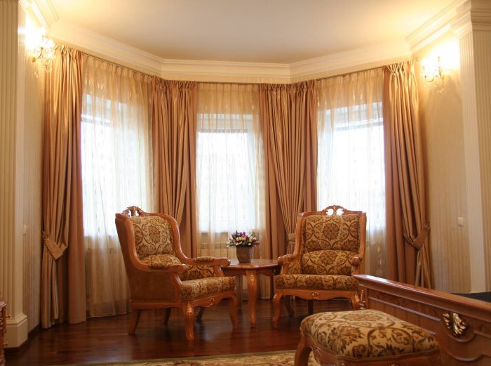 Classic curtains on the windows in the living room