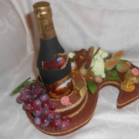 Bouquet as a gift with a bottle of cognac