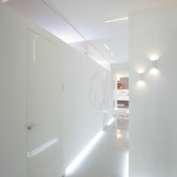 Bright light in a dazzling white hallway