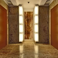 Acrylic stone on the wall in the hallway
