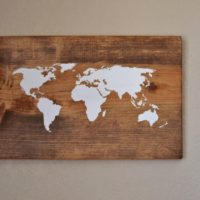 Wooden panel in the form of a world map