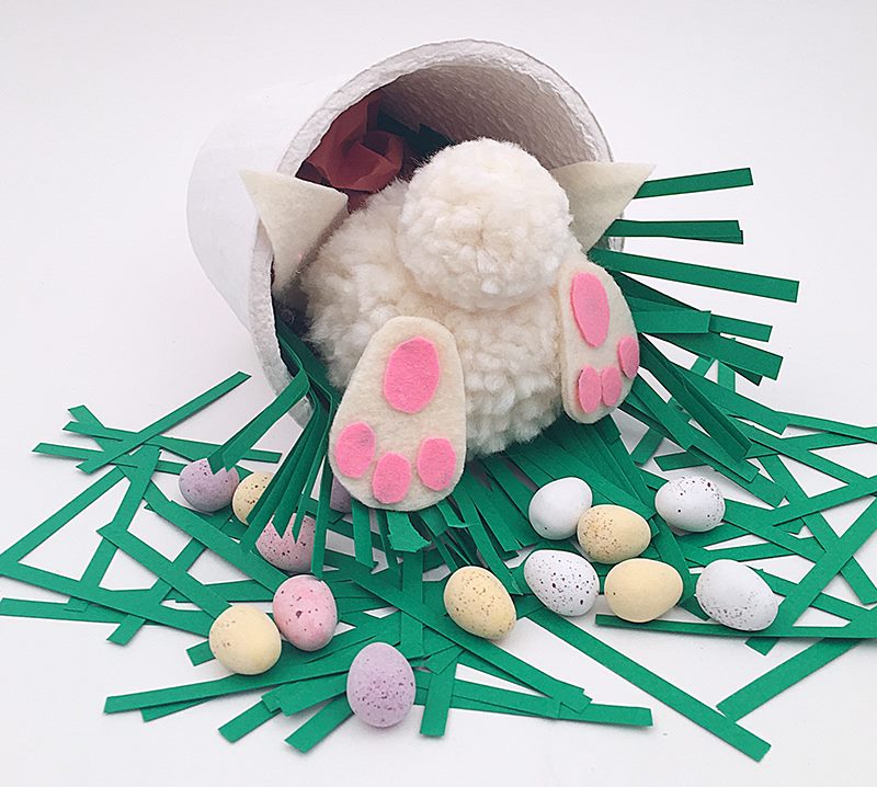 Easter composition with a do-it-yourself toy rabbit