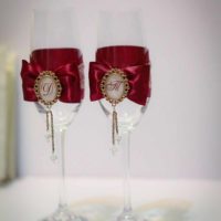 An example of a light decoration of the style of wedding glasses photo