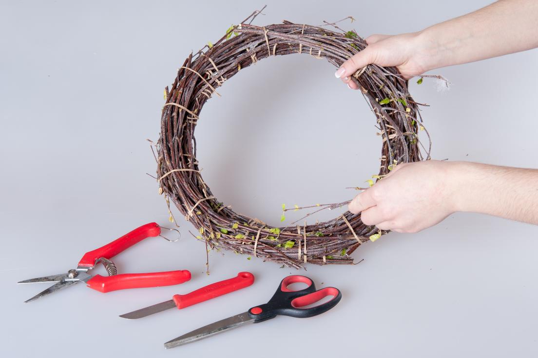 Making DIY Easter wreath of branches