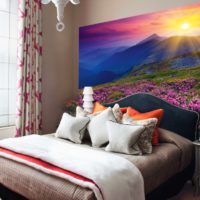 Sunset over the mountains in the bedroom with photo mural
