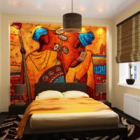 Wall mural on bedroom wall and orange bedspread