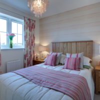 Headboard made of wood above the bed in the bedroom 12 sq m